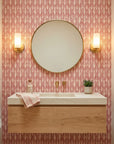 Canyon Ikat terracotta geometric peel and stick wallpaper creating ambiance in a serene bathroom