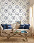 Captain's Wheel navy nautical ship wheel wallpaper in a warm and inviting living room