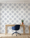Captain's Wheel navy nautical ship wheel wallpaper as a feature wall in a bright home office