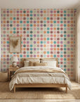 Carnival Cloth vibrant multicolor polka dot wallpaper adding character to a cozy bedroom