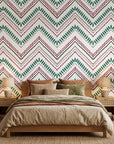 Carnival Stripe teal and burgundy chevron wallpaper in a warm and inviting living room