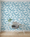 Cerulean Eden lush blue jungle wallpaper as a feature wall in a bright home office