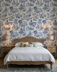 Cerulean Estate classic blue toile landscape wallpaper adding character to a cozy bedroom