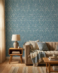 Cerulean Garden distressed geometric wallpaper in a warm and inviting living room