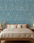 Cerulean Garden distressed geometric wallpaper adding character to a cozy bedroom