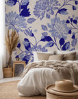 Self-adhesive, removable wall covering featuring an elegant blue floral pattern on an ivory ground, known as Cerulean Cascade
