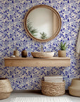 Elegant cerulean blue flower pattern removable wallpaper applied over a cream-colored wall surface - Cerulean Cascade