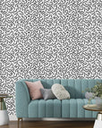 Abstract monochrome wall mural with Memphis-inspired shapes and high-contrast black and white graphics - Chaotic Curves