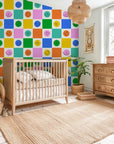 Vibrant checkered grid featuring cheerful emoticons on a matte adhesive wall graphic - Cheery Checks