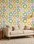 Chromatic Echoes retro colorful geometric wallpaper in a warm and inviting living room