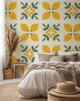 Geometric tiled background featuring yellow citrus and verdant foliage