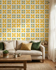 Citrus Bloom yellow lemon and green geometric tile wallpaper in a warm and inviting living room
