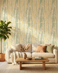 Citrus Scale green and gold abstract wallpaper in a warm and inviting living room