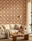 Clay Burst rustic orange floral wallpaper in a warm and inviting living room