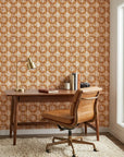 Clay Burst rustic orange floral wallpaper as a feature wall in a bright home office