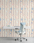 Coastal Rhythm striped wave wallpaper as a feature wall in a bright home office