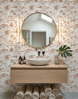 Coastal Village terracotta palm toile wallpaper creating ambiance in a serene bathroom