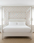 Coastal Feast coral seafood damask wallpaper adding character to a cozy bedroom