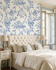 Cobalt Bloom bold blue chinoiserie floral wallpaper adding character to a cozy bedroom