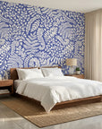 Cobalt Canopy blue leaf wallpaper adding character to a cozy bedroom