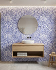 Cobalt Canopy blue leaf wallpaper creating ambiance in a serene bathroom