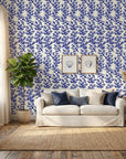 Cobalt Coral bold blue reef wallpaper in a warm and inviting living room