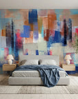 Cobalt Fragments blue and blush abstract wallpaper in a warm and inviting living room