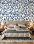 Cobalt Leaf blue botanical peel and stick wallpaper in a warm and inviting living room