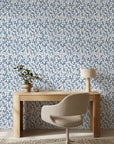 Cobalt Leaf blue botanical peel and stick wallpaper adding character to a cozy bedroom