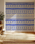 Hand-drawn blue stripes on cream bohemian-style removable wallpaper