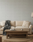 Cobalt Grain grey woven texture wallpaper in a warm and inviting living room