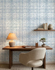 Concrete Drift blue & grey abstract wallpaper as a feature wall in a bright home office