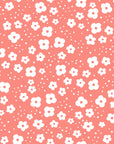 Smooth coral pink small ditsy floral peel and stick wallpaper - Coral Cascade