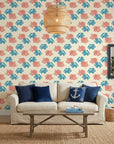 Coral Cove playful coral and blue wallpaper in a warm and inviting living room
