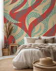 Abstract wavy pattern in shades of coral and blue with a dotted texture on peel and stick wallpaper