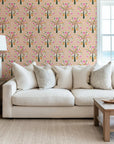 Vibrant bohemian wallpaper featuring tropical pineapples and palm leaves inside arch patterns
