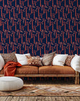 Deep blue tropical wall covering accented by vibrant coral palm silhouettes, named Coral Sway