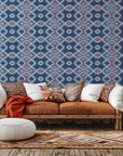 A wall covering in navy blue and red, featuring a Bandhani-style dotted geometric design, known as "Cosmic Chain"