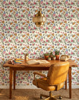 Cottage Scatter pink and blue floral peel and stick wallpaper as a feature wall in a bright home office