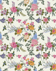 Cottage Scatter pink and blue floral peel and stick wallpaper creating ambiance in a serene bathroom