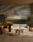 Countryside at Dusk mural wallpaper featuring pastoral landscape with dramatic cloudy skies in living room