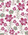 Floral patterned wallpaper (Crimson Grove) in contrasting magenta and green colors, enhanced by a painterly, textured finish