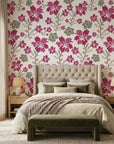 Crimson Grove magenta and green textured ikat floral wallpaper in a warm and inviting living room