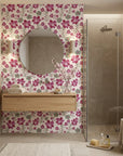 Crimson Grove magenta and green textured ikat floral wallpaper creating ambiance in a serene bathroom