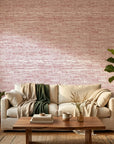 Crimson Horizon textured red abstract wallpaper in a warm and inviting living room