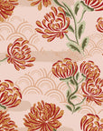 Self-adhesive wallpaper featuring a maroon ditsy floral pattern and scattered rose-colored hearts. Product: Crimson Whispers