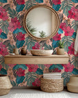 Bright pink hibiscus blossoms paired with teal foliage on removable wallpaper.