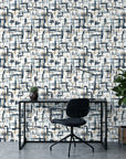 Crosshatch Canvas navy blue and beige abstract brushstroke wallpaper as a feature wall in a bright home office