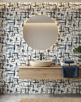 Crosshatch Canvas navy blue and beige abstract brushstroke wallpaper creating ambiance in a serene bathroom