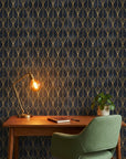 Crystal Noir dramatic black and gold art deco wallpaper adding character to a cozy bedroom